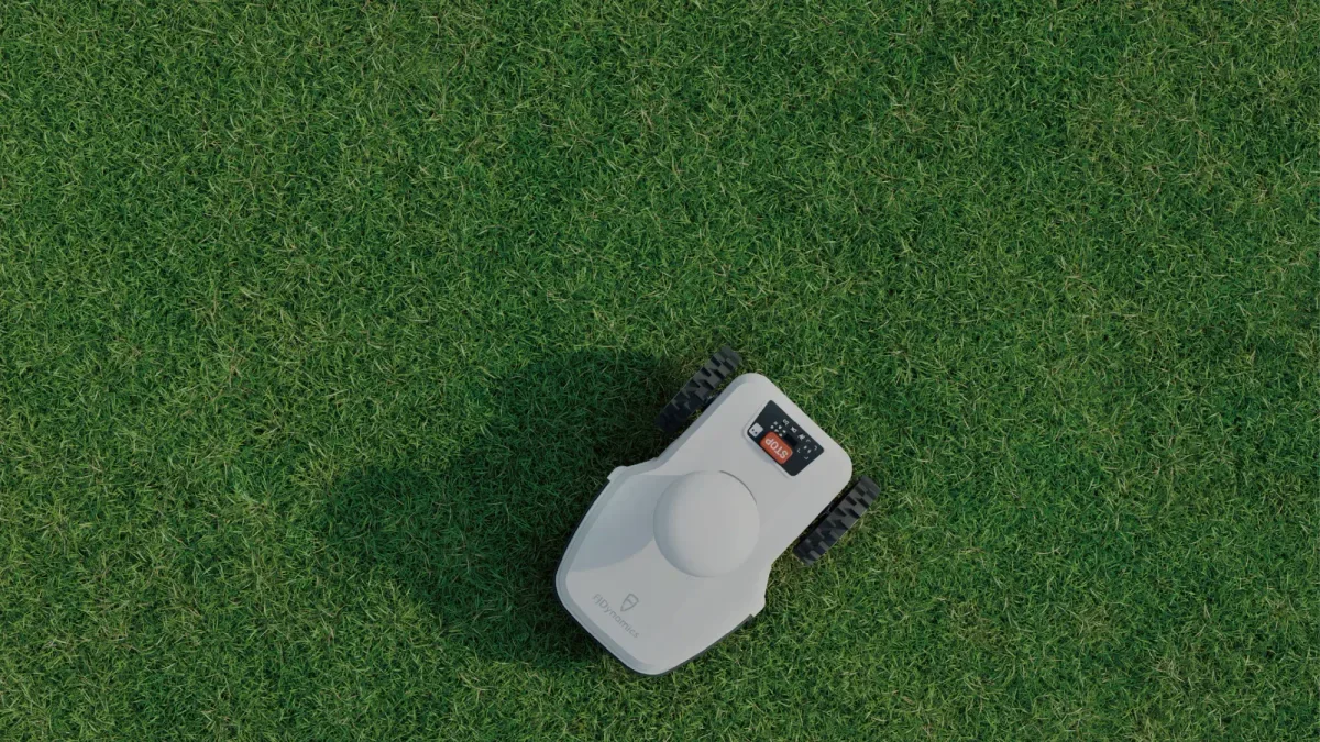 FJD FR4000 robotic mower on a residential lawn